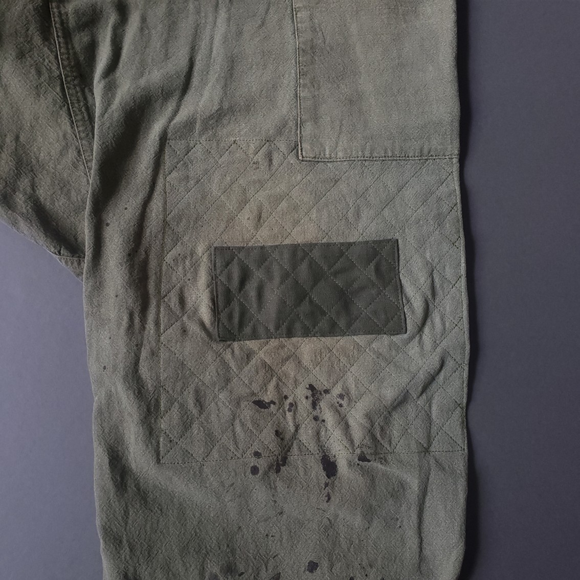 お直し後：当て布とステッチで補強