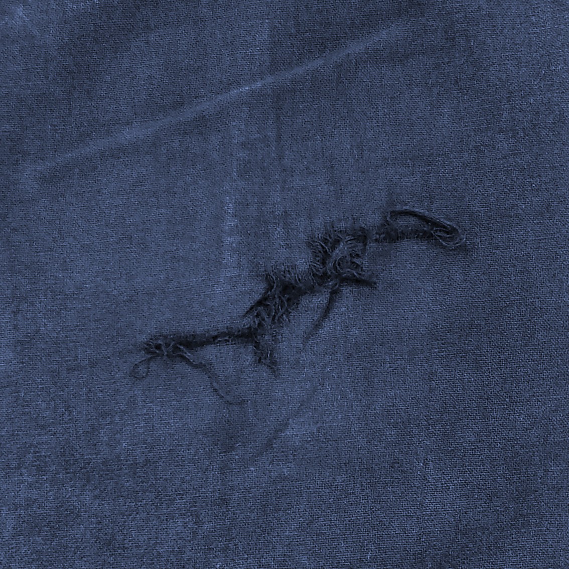 お直し前：膝部分の破れ